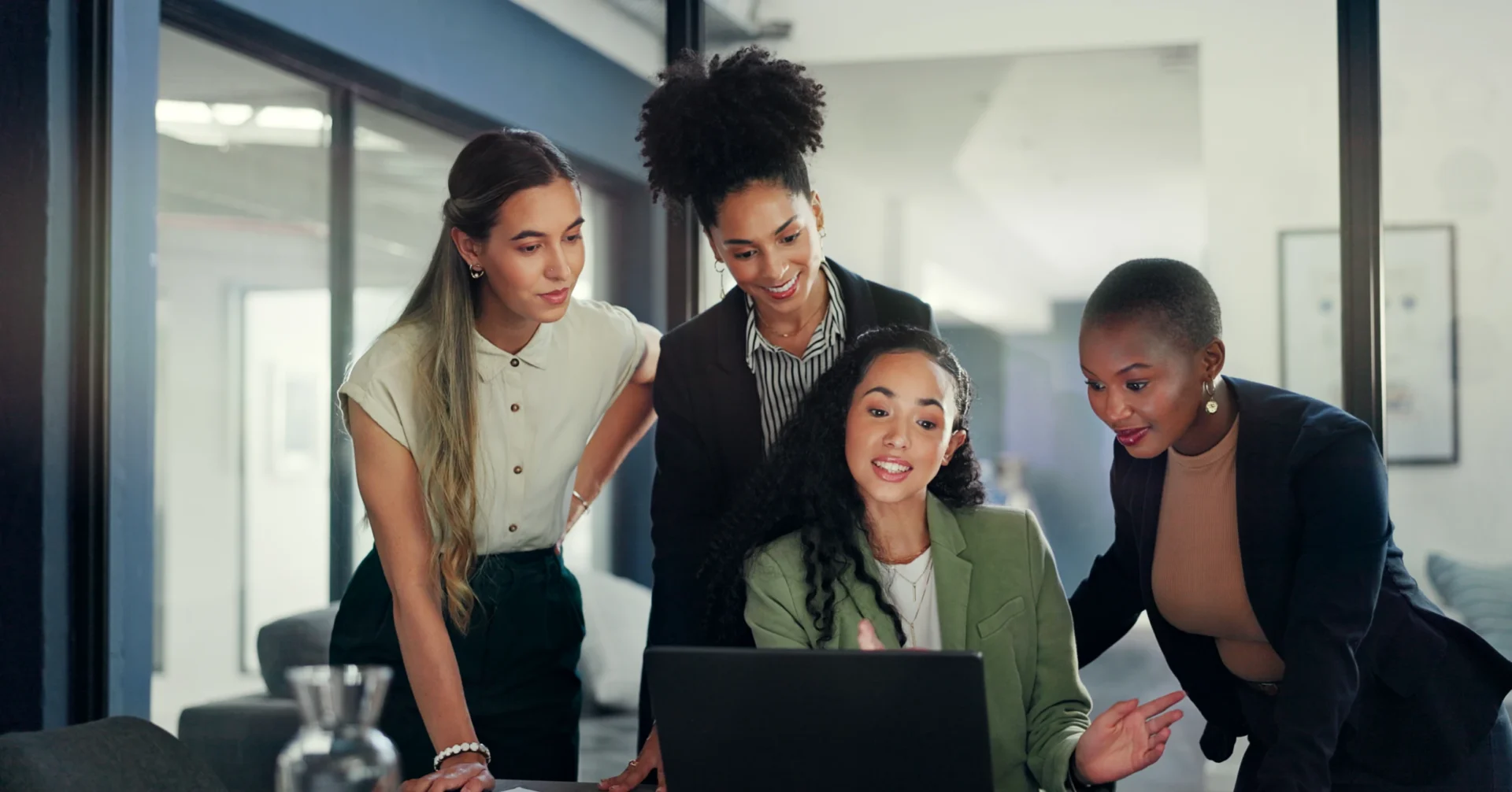 Colleagues working together at desk