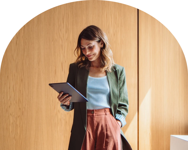 Casual businesswoman using digital device