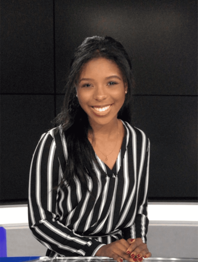 Female presenter with long hair